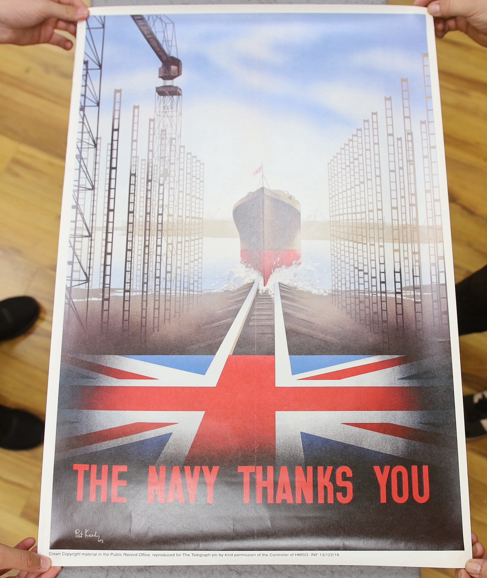 Seven facsimile re-print WWII propaganda posters and a poster of a spitfire